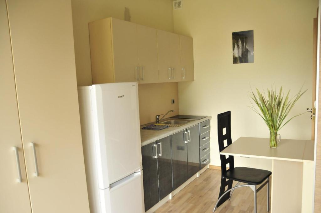 Apartamentai Trys Pusys Šventoji Habitación foto